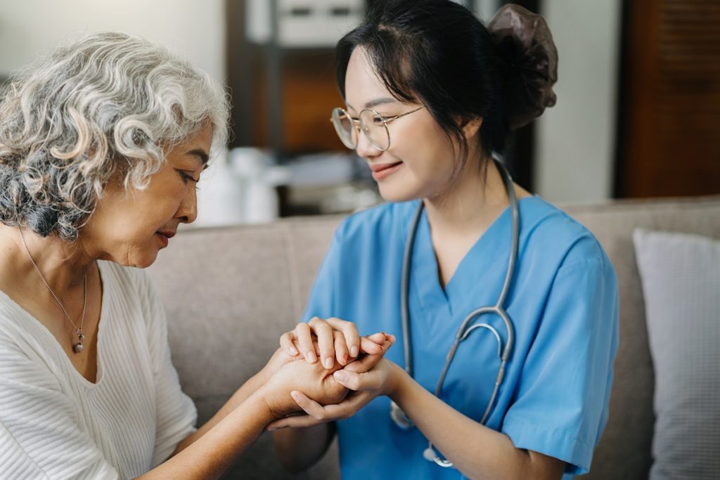 A nurse with an elderly patient